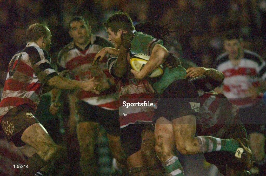 18 January 2002; Eoin Reddan, Connacht, is tackled by Richard Parks, Pontypridd. Parker Pen Challenge Cup Quarter Final Second Leg, Pontypridd v Connacht, Rugby, Sardis Road, Pontypridd, Wales. Picture credit; Damien Eagers / SPORTSFILE *EDI*