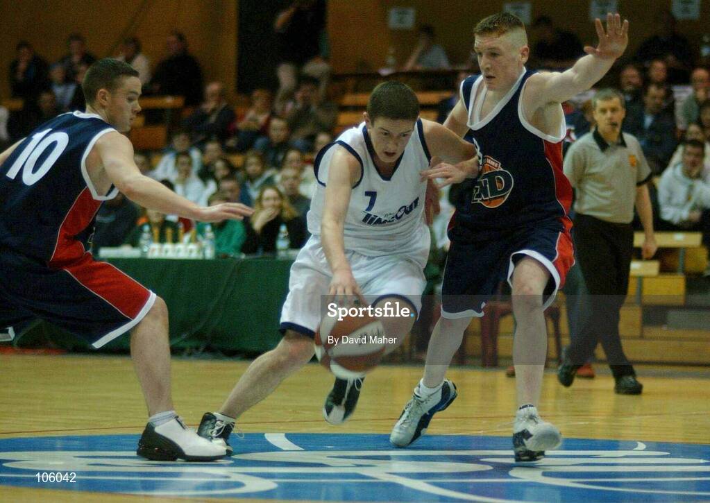 31 January 2003; Andrew Lydon, Castlebar, in action against John Biggins, left, and Scott Kinevane, Delta Notre Dame. Castlebar v Delta Notre Dame, ESB National Cup 2003 Junior men semi-final, ESB Arena, Tallaght, Co. Dublin. Picture credit; David Maher / SPORTSFILE *EDI*