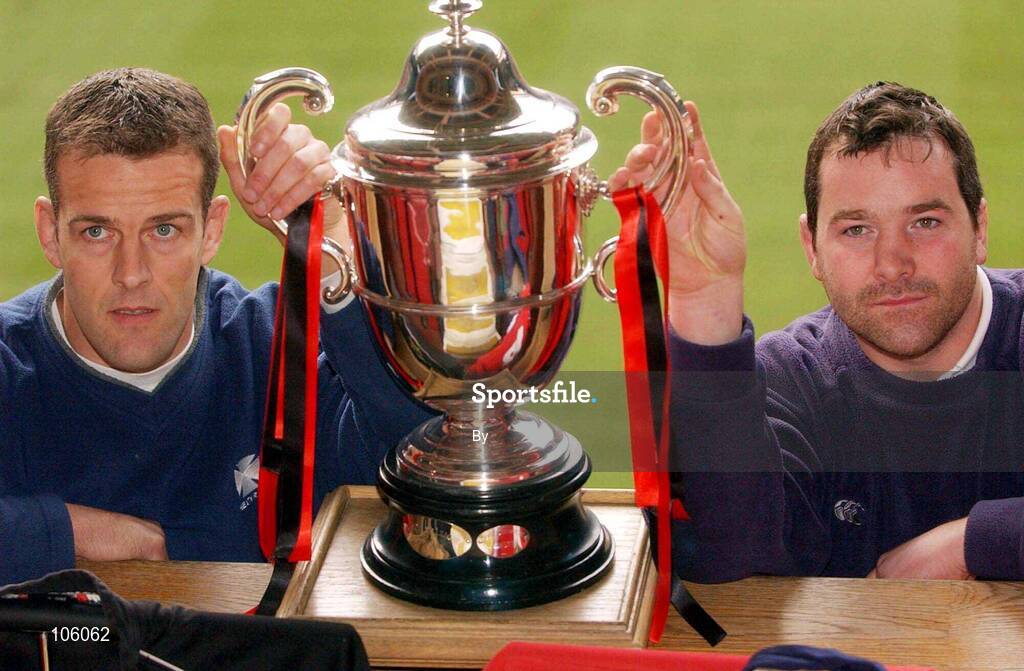 31 January 2003; Neaths Gareth Llewellyn, left, and Munsters Anthony Foley with the Celtic league trophy pictured in The Millenium Stadium, Cardiff, Wales. Rugby. Picture credit; Brian Lawless / SPORTSFILE *EDI*