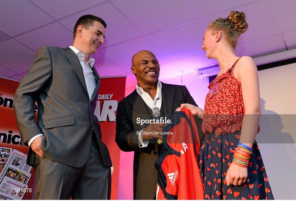 10 October 2012; Former undisputed heavyweight boxing champion Mike Tyson is presented with a Munster rugby jersey by Mike O'Regan and Laura O'Regan, age 13, from Bantry, Co. Cork. Thomond Park, Limerick. Picture credit: Diarmuid Greene / SPORTSFILE
