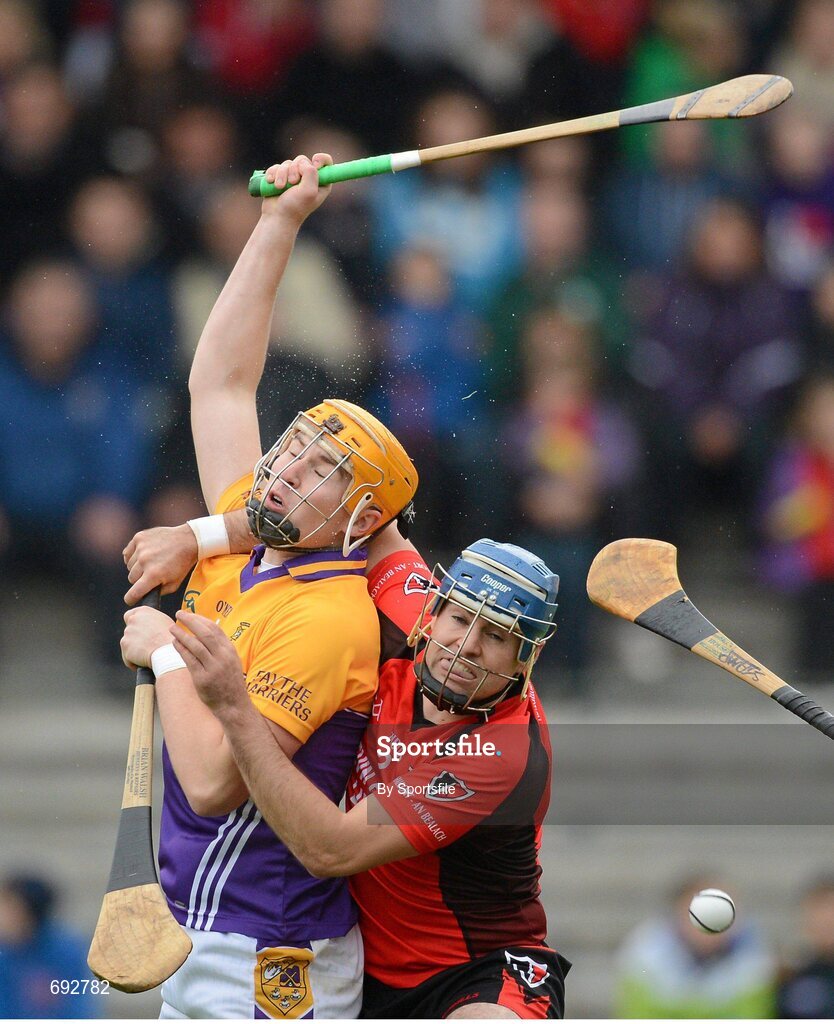 14 October 2012; Rhys Clarke, Faythe Harriers, in action against Dennis Morton, Oulart-the-Ballagh. Wexford County Senior Hurling Championship Final, Oulart-the-Ballagh v Faythe Harriers, Wexford Park, Wexford. Photo by Sportsfile