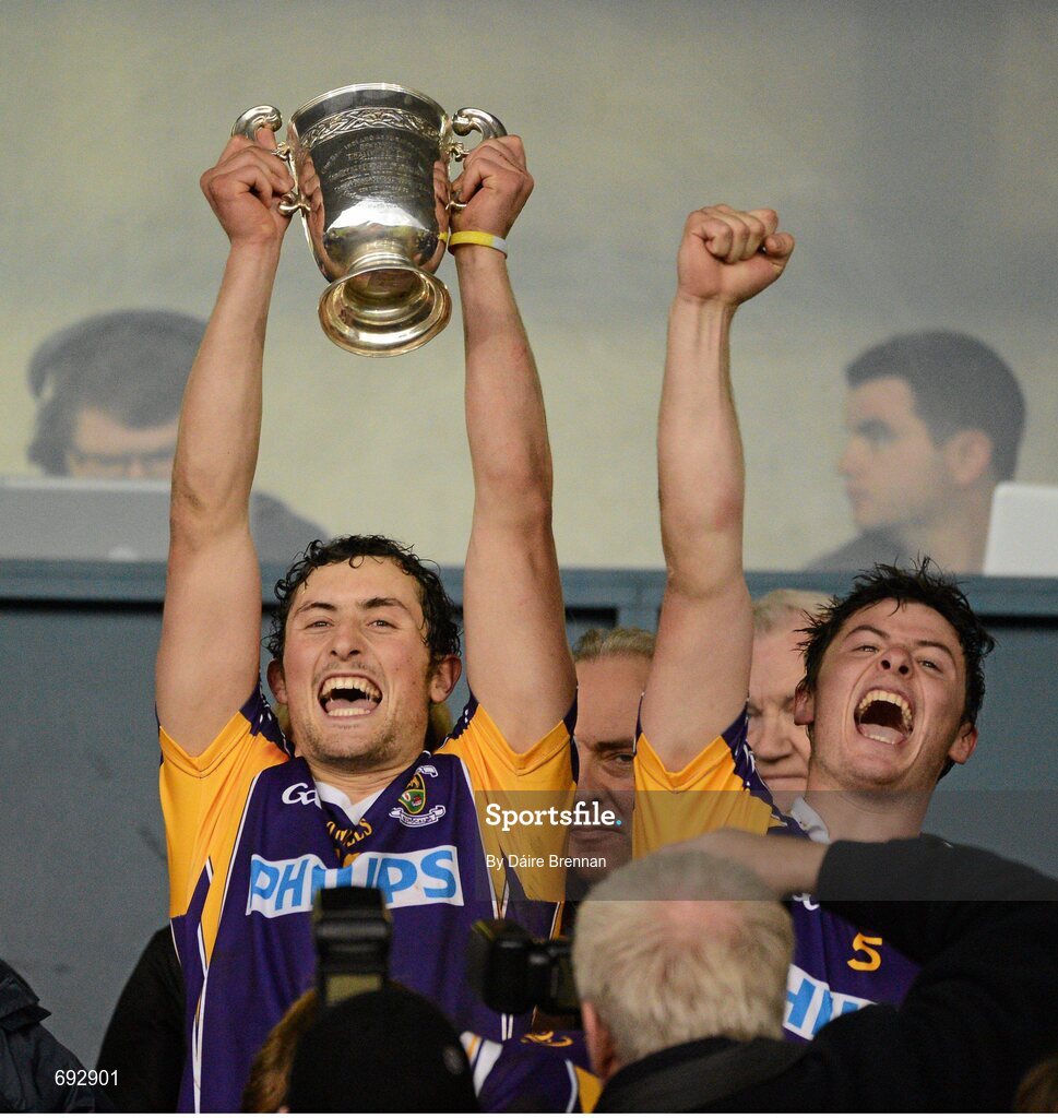 14 October 2012; Kilmacud Crokes captain Ross O'Carroll, along with his brother Bill, lifts the New Ireland Cup following victory in the Dublin County Senior Hurling Championship Final match between Cuala and Kilmacud Crokes at Parnell Park in Dublin. Photo by Dáire Brennan/Sportsfile