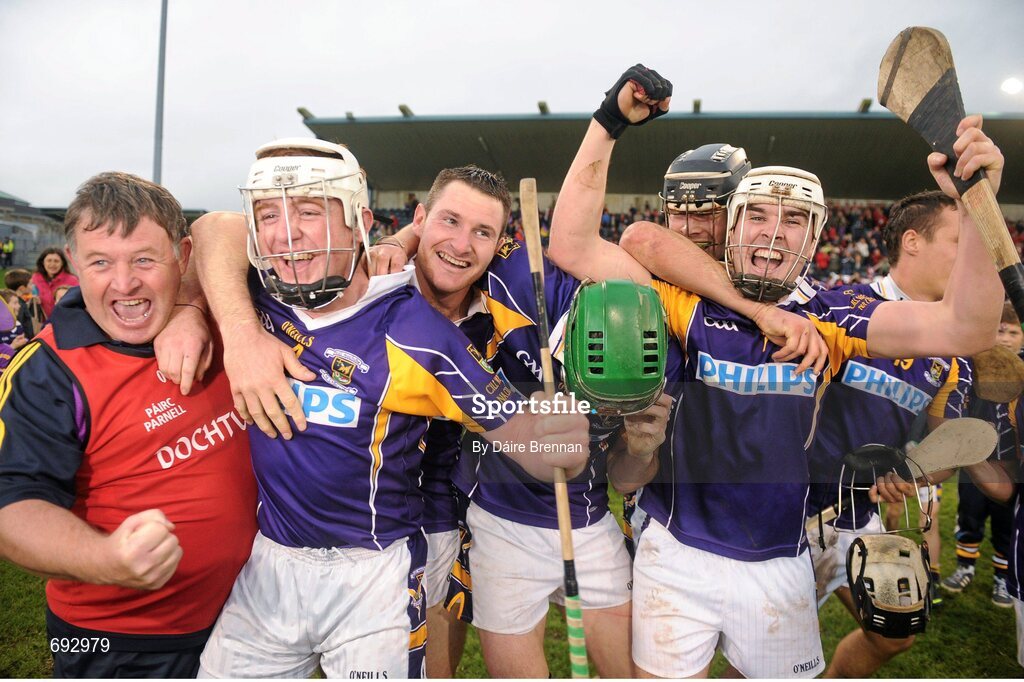 14 October 2012; Kilmacud Crokes players and mentors, left to right, Dr. Chris Thompson, Jack Doughan, Niall Corcoran, Seán McGrath, Jude Sweeney, and Robert O'Loughlin, celebrate after the game. Dublin County Senior Hurling Championship Final, Cuala v Kilmacud Crokes, Parnell Park, Dublin. Picture credit: Dáire Brennan / SPORTSFILE