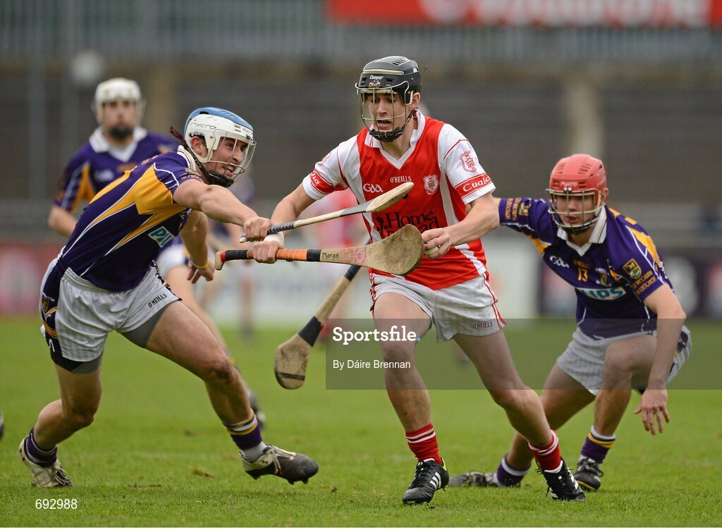 14 October 2012; Seán Moran, Cuala, in action against Ross O'Carroll, left, and Barry O'Rorke, Kilmacud Crokes. Dublin County Senior Hurling Championship Final, Cuala v Kilmacud Crokes, Parnell Park, Dublin. Picture credit: Dáire Brennan / SPORTSFILE