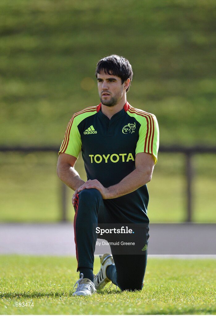 17 October 2012; Munster's Conor Murray stretches during squad training ahead of their side's Heineken Cup, Pool 1, Round 2, game against Edinburgh on Sunday. Munster Rugby Squad Training, University of Limerick, Limerick. Picture credit: Diarmuid Greene / SPORTSFILE