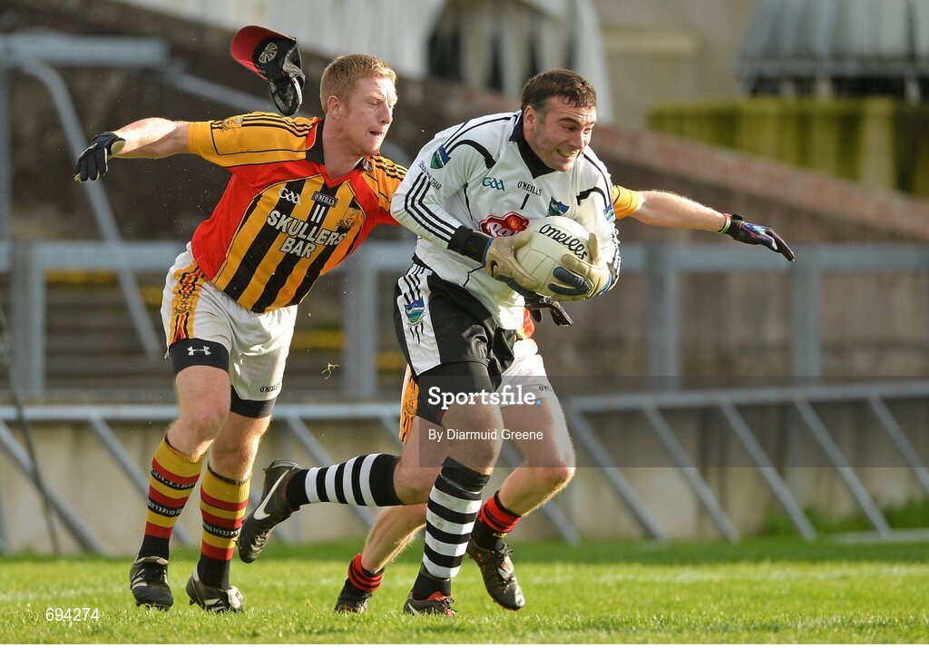 21 October 2012; John Jo Sheehy, Newcastlewest, in action against Patrick Donnelly, Dromcollogher Broadford. Limerick County Senior Football Championship Final, Dromcollogher Broadford v Newcastlewest, Gaelic Grounds, Limerick. Picture credit: Diarmuid Greene / SPORTSFILE