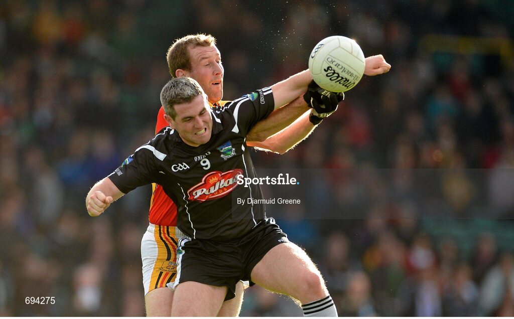 21 October 2012; Shay Lyons, Newcastlewest, in action against Tom McLoughlin, Dromcollogher Broadford. Limerick County Senior Football Championship Final, Dromcollogher Broadford v Newcastlewest, Gaelic Grounds, Limerick. Picture credit: Diarmuid Greene / SPORTSFILE