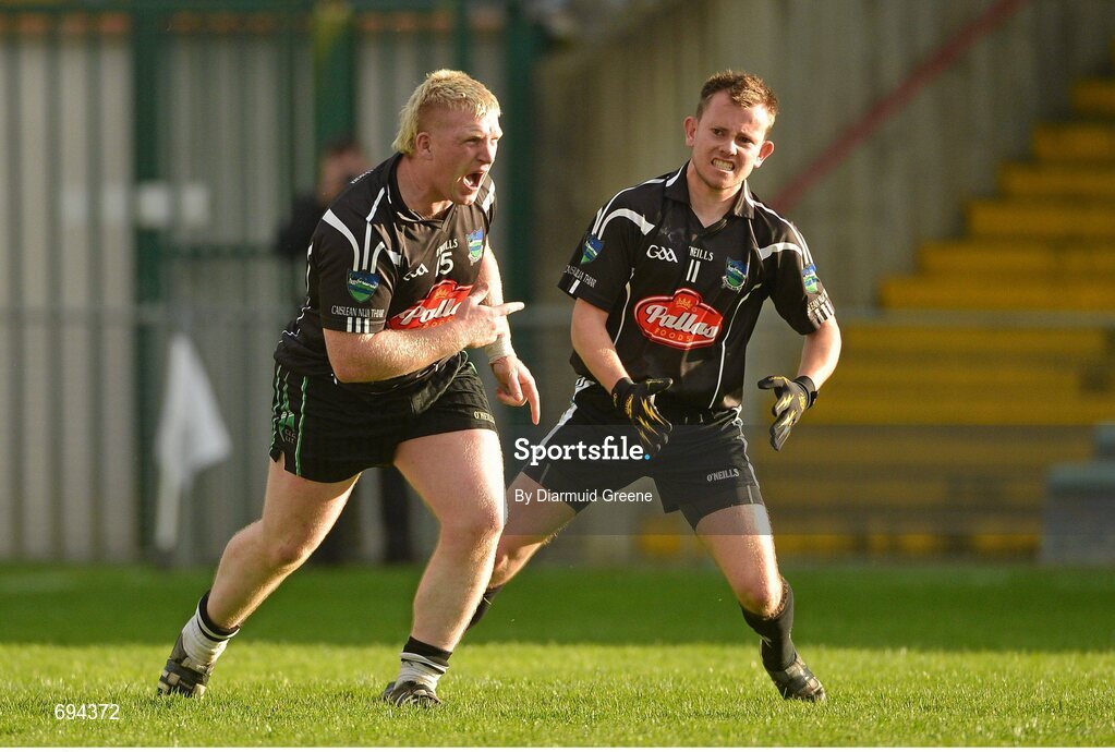21 October 2012; James Kelly, Newcastlewest, left, celebrates alongside team-mate Thomas Quilligan, after scoring a goal during the second half. Limerick County Senior Football Championship Final, Dromcollogher Broadford v Newcastlewest, Gaelic Grounds, Limerick. Picture credit: Diarmuid Greene / SPORTSFILE
