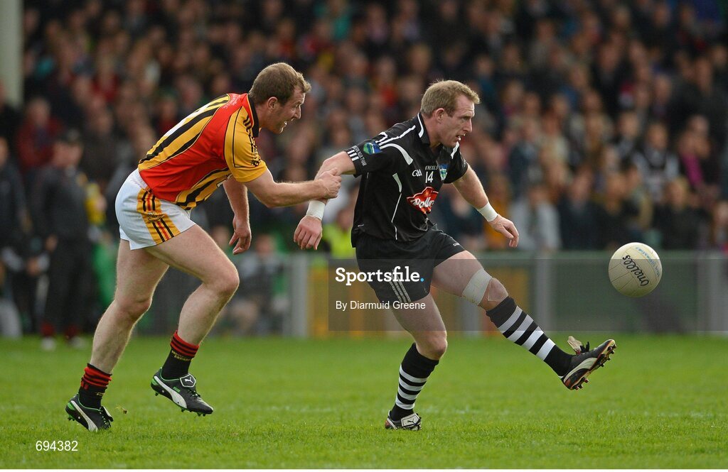 21 October 2012; Stephen Kelly, Newcastlewest, in action against Tom McLoughlin, Dromcollogher Broadford. Limerick County Senior Football Championship Final, Dromcollogher Broadford v Newcastlewest, Gaelic Grounds, Limerick. Picture credit: Diarmuid Greene / SPORTSFILE