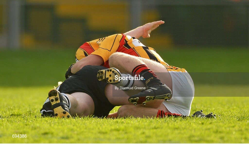 21 October 2012; Mike Boyce, Dromcollogher Broadford, and James Kelly, Newcastlewest, tussle off the ball during the game. Limerick County Senior Football Championship Final, Dromcollogher Broadford v Newcastlewest, Gaelic Grounds, Limerick. Picture credit: Diarmuid Greene / SPORTSFILE