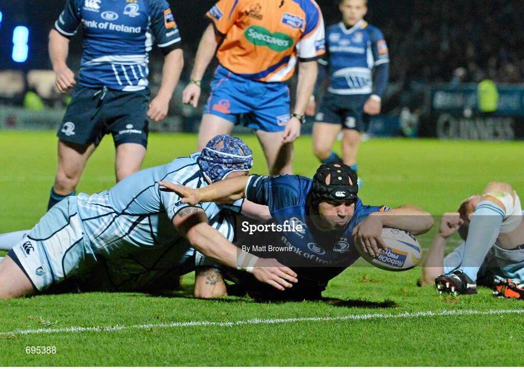 27 October 2012; Richardt Strauss, Leinster, goes over to score his side's first try despite the tackle of Marc Breeze, Cardiff Blues. Celtic League 2012/13, Round 7, Leinster v Cardiff Blues, RDS, Ballsbridge, Dublin. Picture credit: Matt Browne / SPORTSFILE