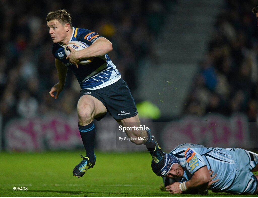 27 October 2012; Brian O'Driscoll, Leinster, is tackled by Marc Breeze, Cardiff Blues. Celtic League 2012/13, Round 7, Leinster v Cardiff Blues, RDS, Ballsbridge, Dublin. Picture credit: Stephen McCarthy / SPORTSFILE