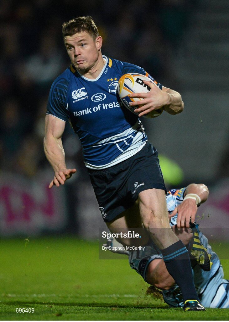 27 October 2012; Brian O'Driscoll, Leinster, is tackled by Marc Breeze, Cardiff Blues. Celtic League 2012/13, Round 7, Leinster v Cardiff Blues, RDS, Ballsbridge, Dublin. Picture credit: Stephen McCarthy / SPORTSFILE