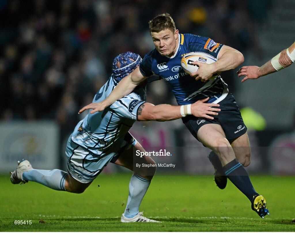 27 October 2012; Brian O'Driscoll, Leinster, is tackled by Marc Breeze, Cardiff Blues. Celtic League 2012/13, Round 7, Leinster v Cardiff Blues, RDS, Ballsbridge, Dublin. Picture credit: Stephen McCarthy / SPORTSFILE