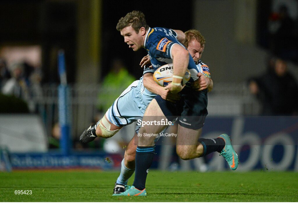 27 October 2012; Gordon D'Arcy, Leinster, is tackled by Scott Andrews, Cardiff Blues. Celtic League 2012/13, Round 7, Leinster v Cardiff Blues, RDS, Ballsbridge, Dublin. Picture credit: Stephen McCarthy / SPORTSFILE