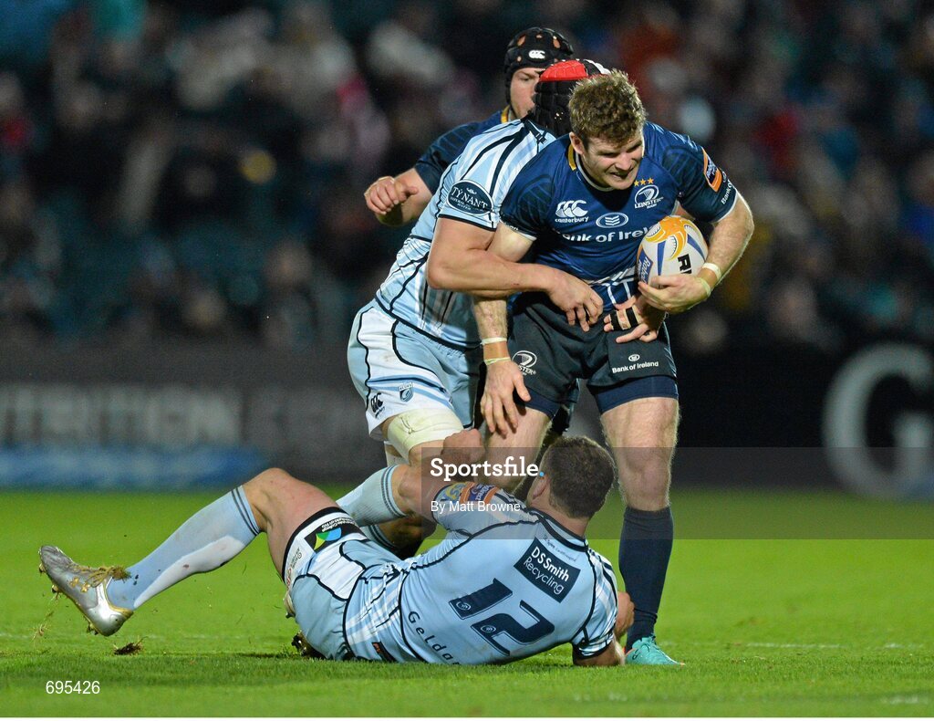 27 October 2012; Gordon D'Arcy, Leinster, is tackled by Sam Warburton and Jamie Roberts,12 , Cardiff Blues. Celtic League 2012/13, Round 7, Leinster v Cardiff Blues, RDS, Ballsbridge, Dublin. Picture credit: Matt Browne / SPORTSFILE