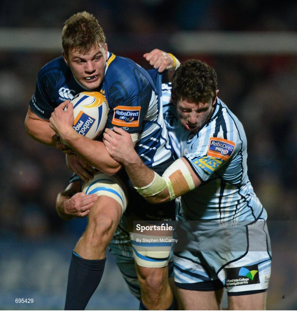 27 October 2012; Jordi Murphy, Leinster, is tackled by Alex Cuthbert, right, and Dafydd Hewitt, Cardiff Blues. Celtic League 2012/13, Round 7, Leinster v Cardiff Blues, RDS, Ballsbridge, Dublin. Picture credit: Stephen McCarthy / SPORTSFILE