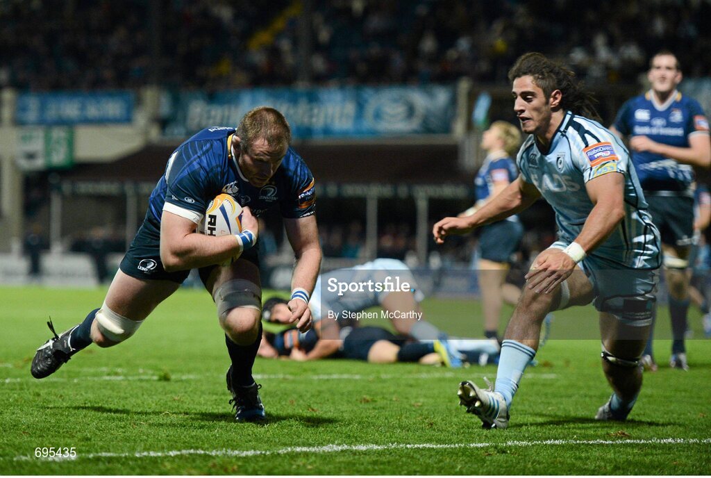 27 October 2012; Damian Browne, Leinster, goes over for his side's eighth try, despite the tackle of Josh Navidi, Cardiff Blues. Celtic League 2012/13, Round 7, Leinster v Cardiff Blues, RDS, Ballsbridge, Dublin. Picture credit: Stephen McCarthy / SPORTSFILE