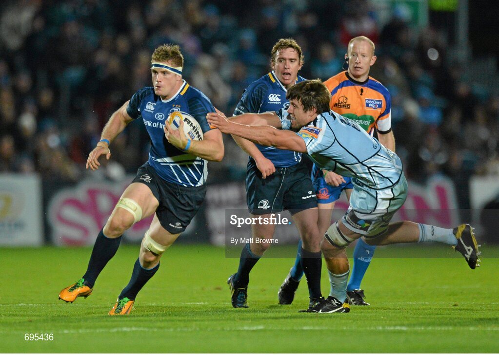 27 October 2012; Jamie Heaslip, Leinster, is tackled by James Down, Cardiff Blues. Celtic League 2012/13, Round 7, Leinster v Cardiff Blues, RDS, Ballsbridge, Dublin. Picture credit: Matt Browne / SPORTSFILE