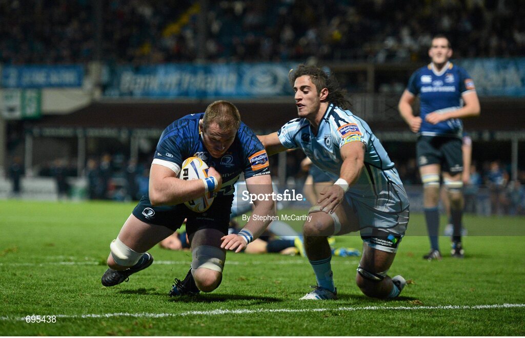 27 October 2012; Damian Browne, Leinster, goes over for his side's eight try, despite the tackle of Josh Navidi, Cardiff Blues. Celtic League 2012/13, Round 7, Leinster v Cardiff Blues, RDS, Ballsbridge, Dublin. Picture credit: Stephen McCarthy / SPORTSFILE