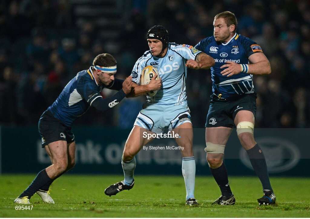 27 October 2012; Tom James, Cardiff Blues, is tackled by Fergus McFadden, left, and Damian Browne, Leinster. Celtic League 2012/13, Round 7, Leinster v Cardiff Blues, RDS, Ballsbridge, Dublin. Picture credit: Stephen McCarthy / SPORTSFILE