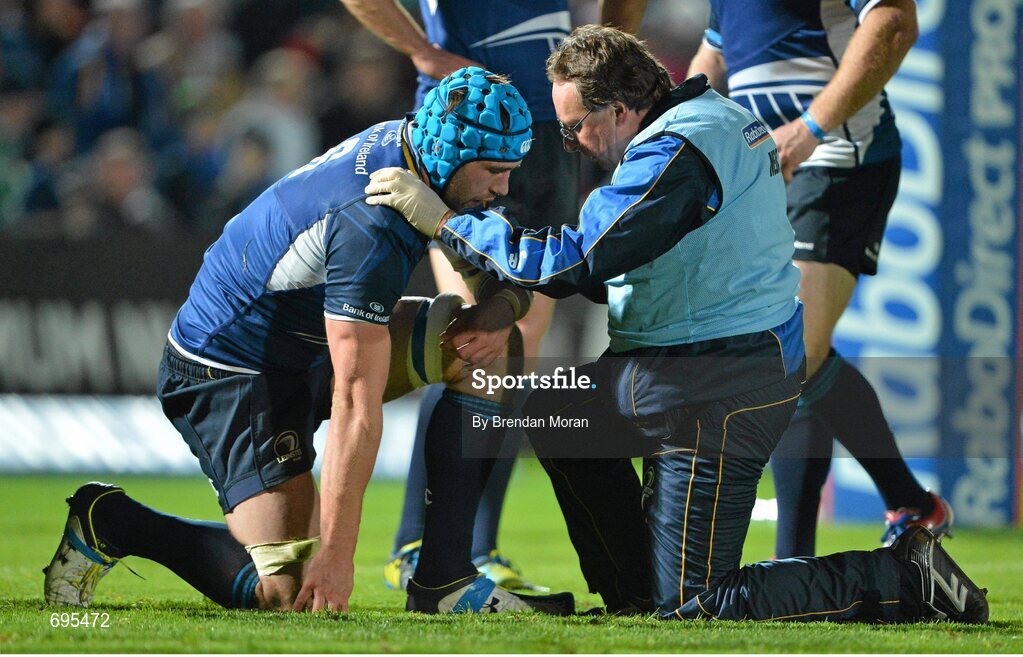 27 October 2012; Kevin McLaughlin, Leinster, is attended to by team doctor John Ryan. Celtic League 2012/13, Round 7, Leinster v Cardiff Blues, RDS, Ballsbridge, Dublin. Picture credit: Brendan Moran / SPORTSFILE