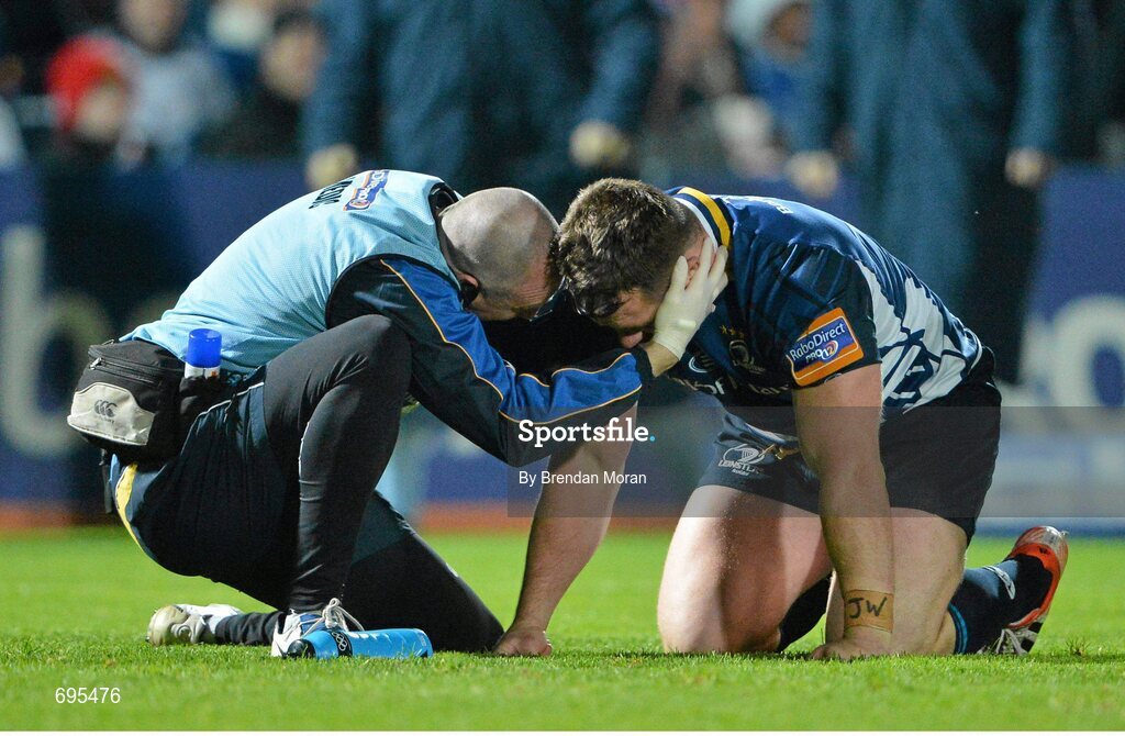 27 October 2012; Cian Healy, Leinster, is attended to by team physio Garreth Farrell. Celtic League 2012/13, Round 7, Leinster v Cardiff Blues, RDS, Ballsbridge, Dublin. Picture credit: Brendan Moran / SPORTSFILE