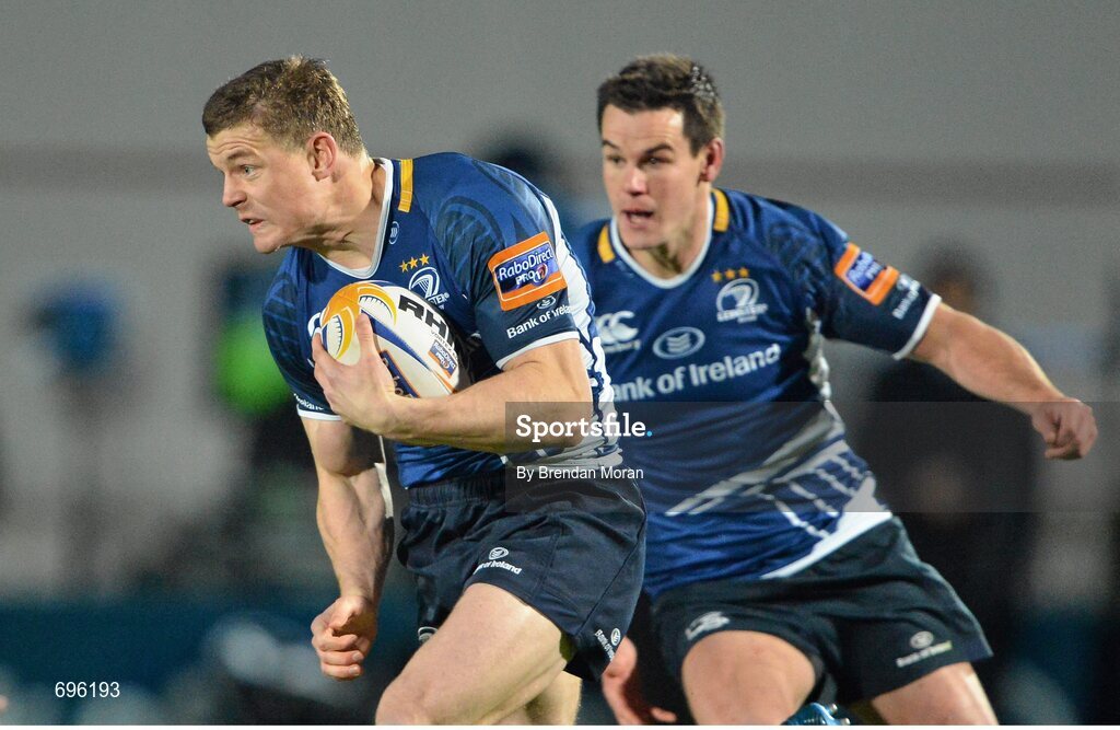 27 October 2012; Brian O'Driscoll, Leinster, on the attack, supported by team-mate Jonathan Sexton. Celtic League 2012/13, Round 7, Leinster v Cardiff Blues, RDS, Ballsbridge, Dublin. Picture credit: Brendan Moran / SPORTSFILE