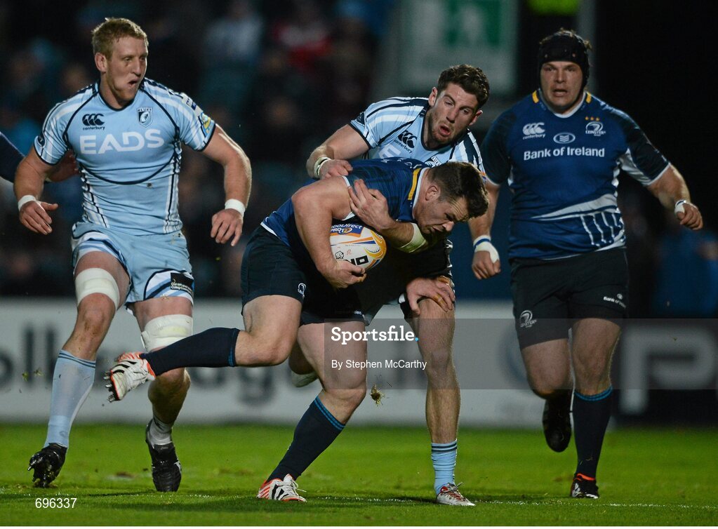 27 October 2012; Cian Healy, Leinster, is tackled by Alex Cuthbert, Cardiff Blues. Celtic League 2012/13, Round 7, Leinster v Cardiff Blues, RDS, Ballsbridge, Dublin. Picture credit: Stephen McCarthy / SPORTSFILE