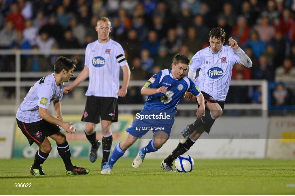 2 November 2012; Sean Maguire, Waterford United, in action against Stephen McDonnell, left, Chris Shields and Paul Whelan, Dundalk. Airtricity League Promotion / Relegation Play-Off Final, 2nd Leg, Waterford United v Dundalk, RSC, Waterford. Picture credit: Matt Browne / SPORTSFILE