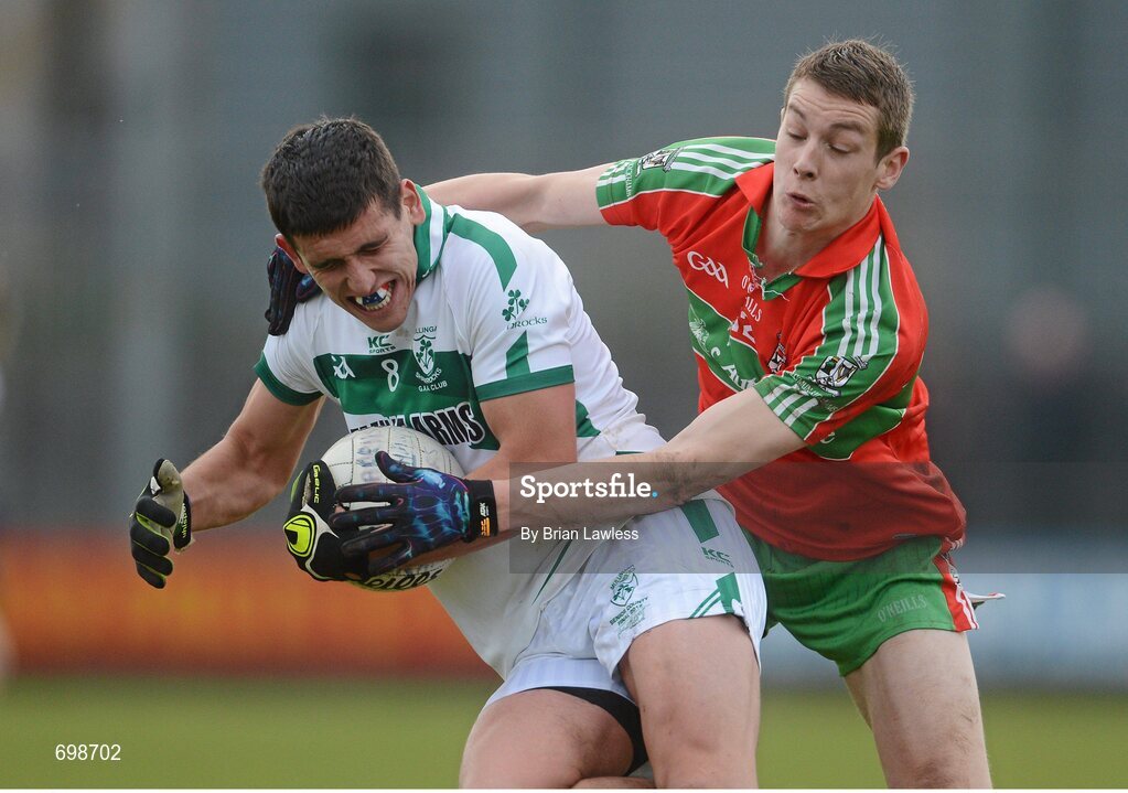 11 November 2012; Denis Corroon, Mullingar Shamrocks, in action against Jason Whelan, Ballymun Kickhams. AIB Leinster GAA Football Senior Championship Quarter-Final, Mullingar Shamrocks, Westmeath v Ballymun Kickhams, Dublin, Cusack Park, Mullingar, Co. Westmeath. Picture credit: Brian Lawless / SPORTSFILE