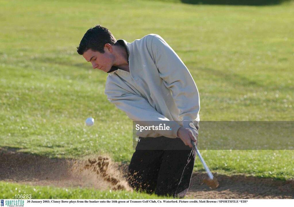 30 January 2003; Clancy Bowe plays from the bunker onto the 16th green at Tramore Golf Club, Co. Waterford. Picture credit; Matt Browne / SPORTSFILE *EDI*