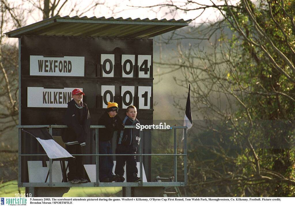 5 January 2003; The scoreboard attendents pictured during the game. Wexford v Kilkenny, O'Byrne Cup First Round, Tom Walsh Park, Skeoughvosteen, Co. Kilkenny. Football. Picture credit; Brendan Moran / SPORTSFILE