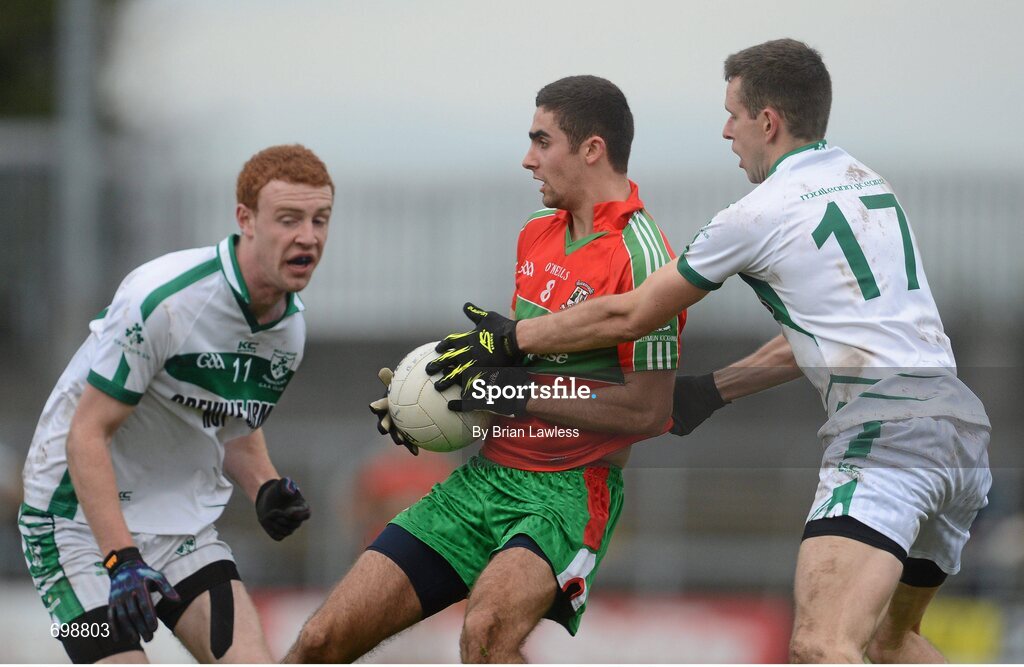 11 November 2012; James McCarthy, Ballymun Kickhams, in action against Anthony Clinton, right, and Sean Daly, Mullingar Shamrocks. AIB Leinster GAA Football Senior Championship Quarter-Final, Mullingar Shamrocks, Westmeath v Ballymun Kickhams, Dublin, Cusack Park, Mullingar, Co. Westmeath. Picture credit: Brian Lawless / SPORTSFILE