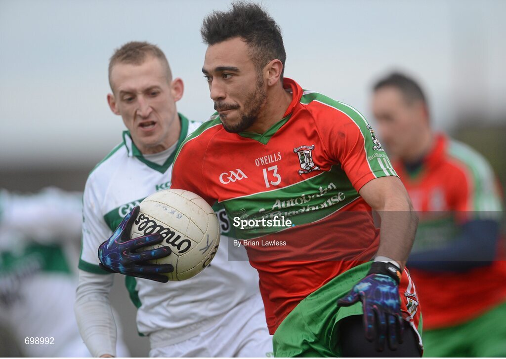 11 November 2012; Ted Furman, Ballymun Kickhams, in action against Enda Dolan, Mullingar Shamrocks. AIB Leinster GAA Football Senior Championship Quarter-Final, Mullingar Shamrocks, Westmeath v Ballymun Kickhams, Dublin, Cusack Park, Mullingar, Co. Westmeath. Picture credit: Brian Lawless / SPORTSFILE