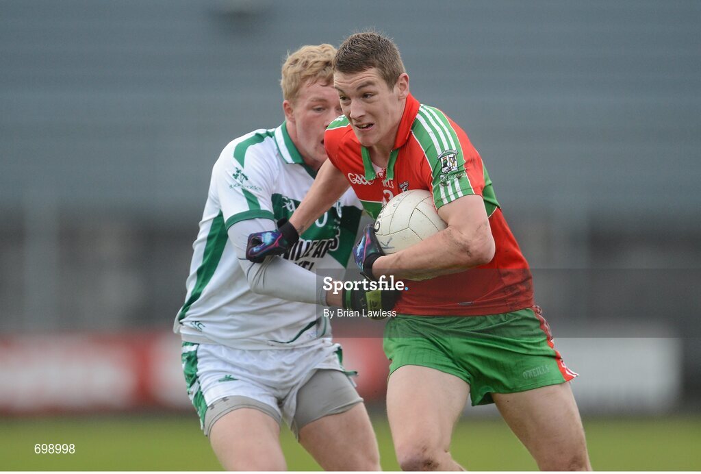 11 November 2012; Jason Whelan, Ballymun Kickhams, in action against Killian Daly, Mullingar Shamrocks. AIB Leinster GAA Football Senior Championship Quarter-Final, Mullingar Shamrocks, Westmeath v Ballymun Kickhams, Dublin, Cusack Park, Mullingar, Co. Westmeath. Picture credit: Brian Lawless / SPORTSFILE