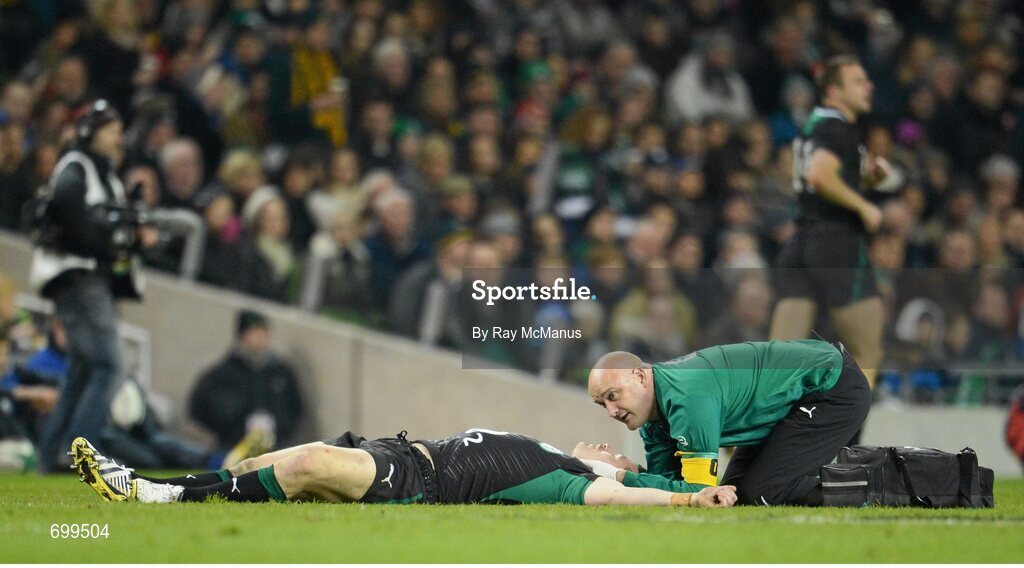 10 November 2012; Cian Healy, Ireland, is attended to by team-doctor Dr. Eanna Falvey. Autumn International, Ireland v South Africa, Aviva Stadium, Lansdowne Road, Dublin. Picture credit: Ray McManus / SPORTSFILE