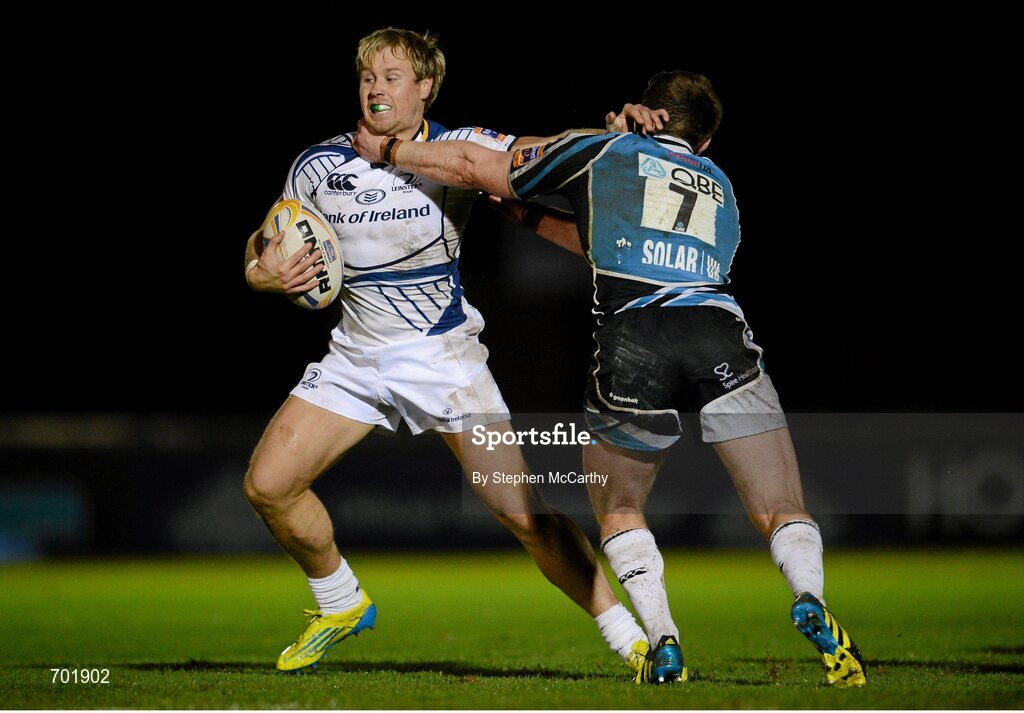 23 November 2012; Fionn Carr, Leinster, is tackled by Chris Fusaro, Glasgow Warriors. Celtic League 2012/13, Round 9, Glasgow Warriors v Leinster, Scotstoun Stadium, Glasgow, Scotland. Picture credit: Stephen McCarthy / SPORTSFILE
