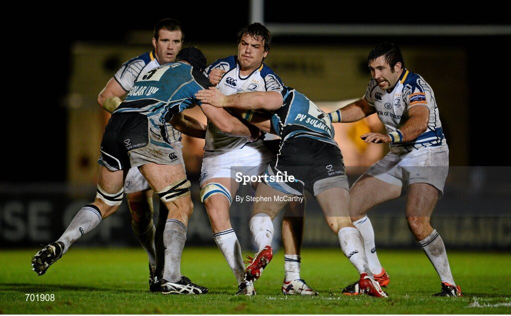 23 November 2012; Quinn Roux, Leinster, is tackled by Rob Harley, left, and Pat MacArthur, Glasgow Warriors. Celtic League 2012/13, Round 9, Glasgow Warriors v Leinster, Scotstoun Stadium, Glasgow, Scotland. Picture credit: Stephen McCarthy / SPORTSFILE