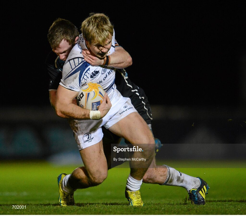 23 November 2012; Fionn Carr, Leinster, is tackled by Chris Fusaro, Glasgow Warriors. Celtic League 2012/13, Round 9, Glasgow Warriors v Leinster, Scotstoun Stadium, Glasgow, Scotland. Picture credit: Stephen McCarthy / SPORTSFILE