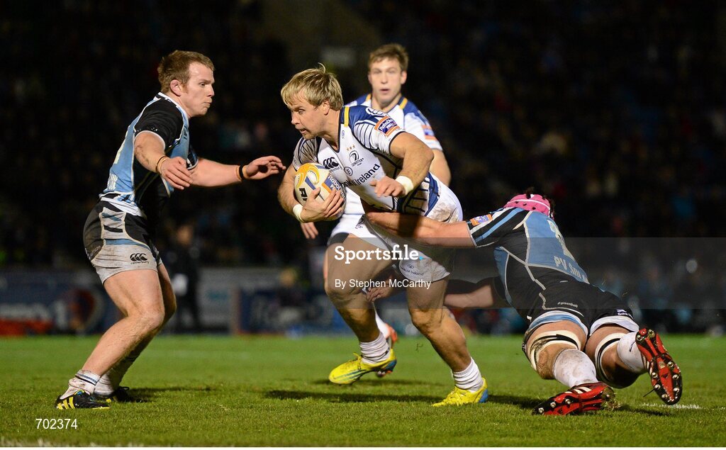 23 November 2012; Fionn Carr, Leinster, is tackled by Tim Swinson, Glasgow Warriors. Celtic League 2012/13, Round 9, Glasgow Warriors v Leinster, Scotstoun Stadium, Glasgow, Scotland. Picture credit: Stephen McCarthy / SPORTSFILE
