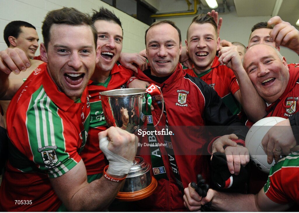 9 December 2012; Ballymun Kickhams manager Paul Curran, centre, celebrates with players, from left, Philly McMahon, Derek Byrne, Elliott Reilly and  Tommy Hennessy, after the game. AIB Leinster GAA Football Senior Club Championship Final, Portlaoise, Laois v Ballymun Kickhams, Dublin, Cusack Park, Mullingar, Co. Westmeath. Picture credit: David Maher / SPORTSFILE