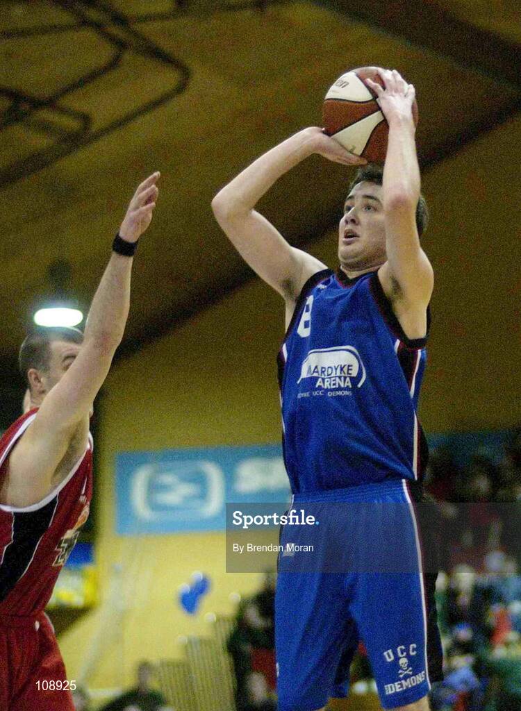 1 February 2003; Shane Coughlan, UCC Demons, in action against Brandon Hughes, Notre Dame. Notre Dame v Mardyke UCC Demons. ESB Men's Basketball Cup semi-final, ESB Arena, Tallaght, Dublin. Basketball. Picture credit; Brendan Moran / SPORTSFILE *EDI*