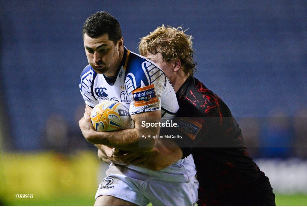 4 January 2013; Rob Kearney, Leinster, is tackled by David Denton, Edinburgh. Celtic League 2012/13, Round 13, Edinburgh v Leinster, Murrayfield, Edinburgh, Scotland. Picture credit: Stephen McCarthy / SPORTSFILE