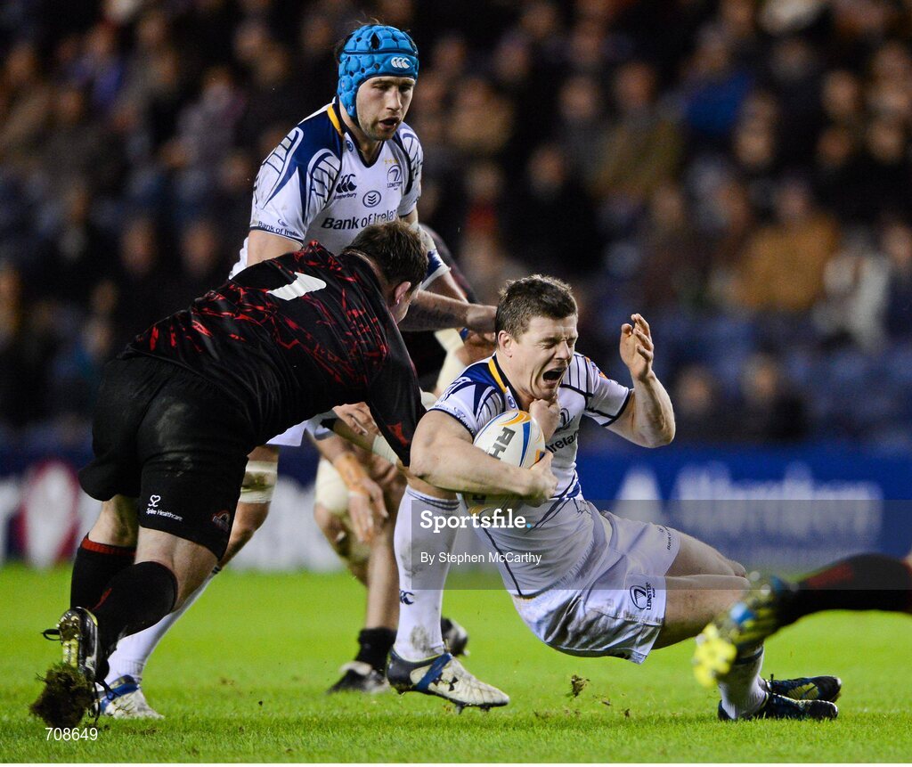 4 January 2013; Brian O'Driscoll, Leinster, is tackled by Allan Jacobsen, Edinburgh. Celtic League 2012/13, Round 13, Edinburgh v Leinster, Murrayfield, Edinburgh, Scotland. Picture credit: Stephen McCarthy / SPORTSFILE