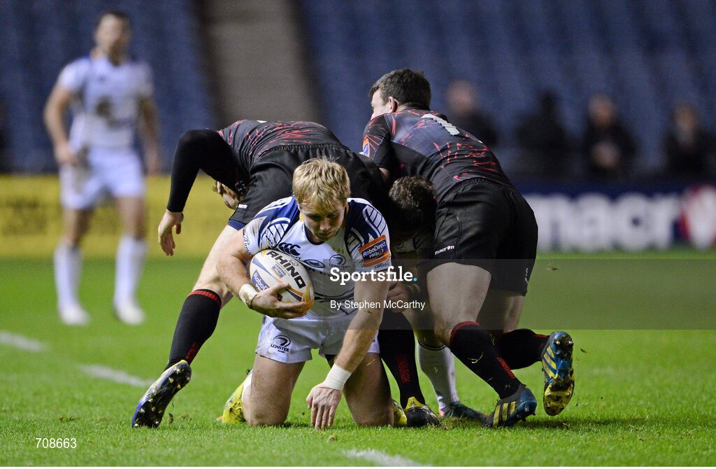 4 January 2013; Fionn Carr, Leinster, comes through the legs of Tim Visser, Edinburgh. Celtic League 2012/13, Round 13, Edinburgh v Leinster, Murrayfield, Edinburgh, Scotland. Picture credit: Stephen McCarthy / SPORTSFILE