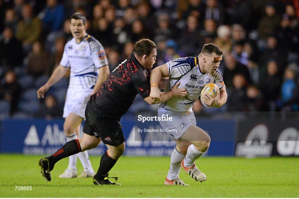 4 January 2013; Cian Healy, Leinster, is tackled by Allan Jacobsen, Edinburgh. Celtic League 2012/13, Round 13, Edinburgh v Leinster, Murrayfield, Edinburgh, Scotland. Picture credit: Stephen McCarthy / SPORTSFILE