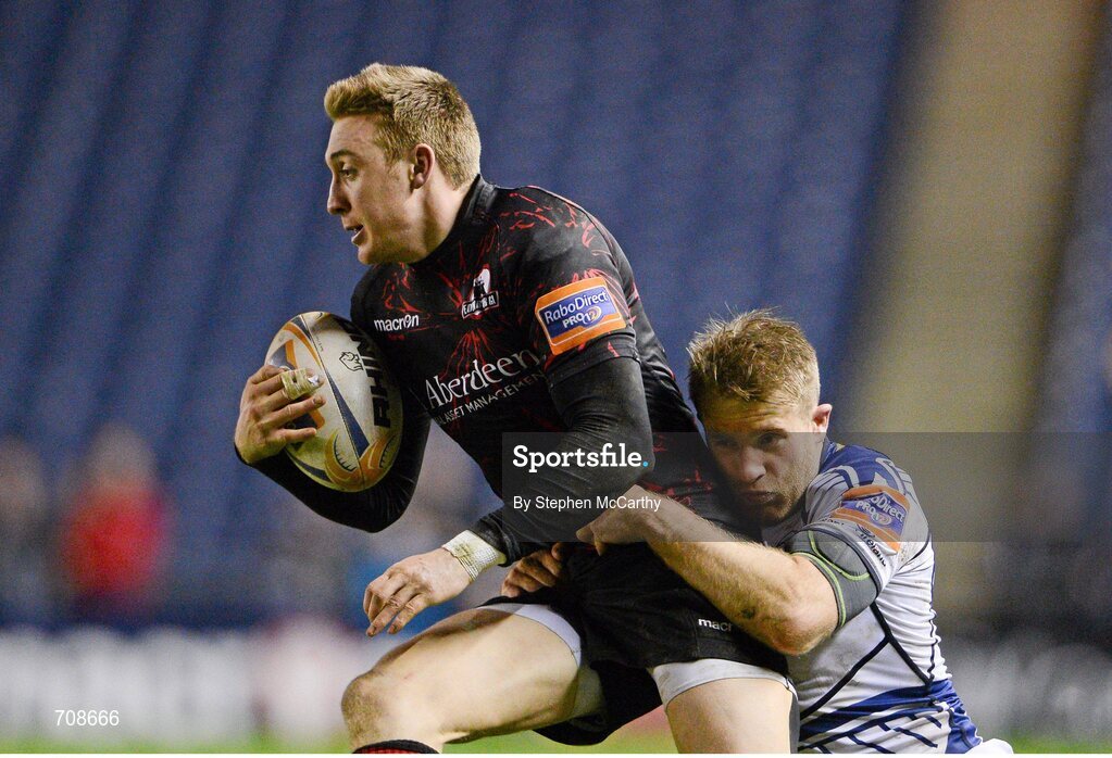 4 January 2013; Dougie Fife, Edinburgh, is tackled by Luke Fitzgerald, Leinster. Celtic League 2012/13, Round 13, Edinburgh v Leinster, Murrayfield, Edinburgh, Scotland. Picture credit: Stephen McCarthy / SPORTSFILE