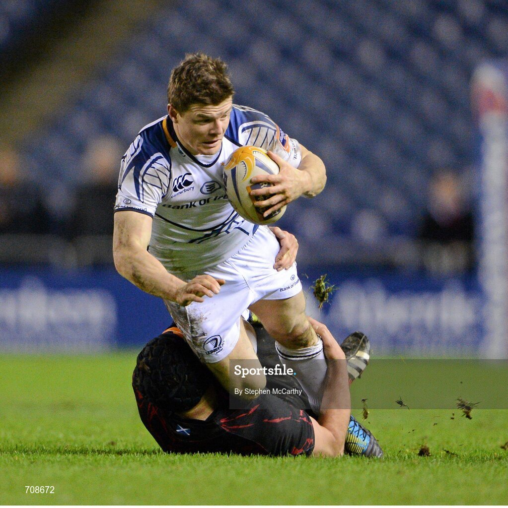 4 January 2013; Brian O'Driscoll, Leinster, is tackled by Grant Gilchrist, Edinburgh. Celtic League 2012/13, Round 13, Edinburgh v Leinster, Murrayfield, Edinburgh, Scotland. Picture credit: Stephen McCarthy / SPORTSFILE