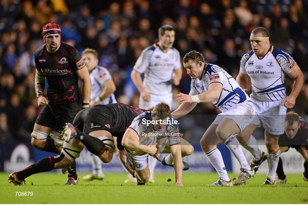 4 January 2013; Brian O'Driscoll, Leinster, is tackled by David Denton, Edinburgh. Celtic League 2012/13, Round 13, Edinburgh v Leinster, Murrayfield, Edinburgh, Scotland. Picture credit: Stephen McCarthy / SPORTSFILE